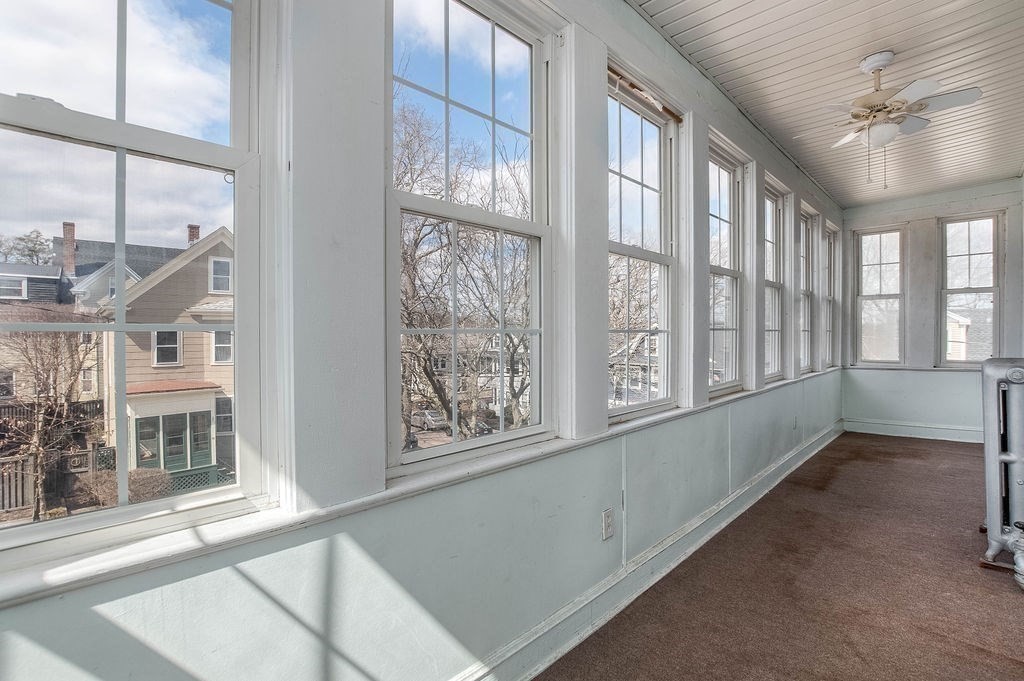 73 Westbourne Street Boston, MA 02131 - Photo 10 of 41 a view of an entryway with a window