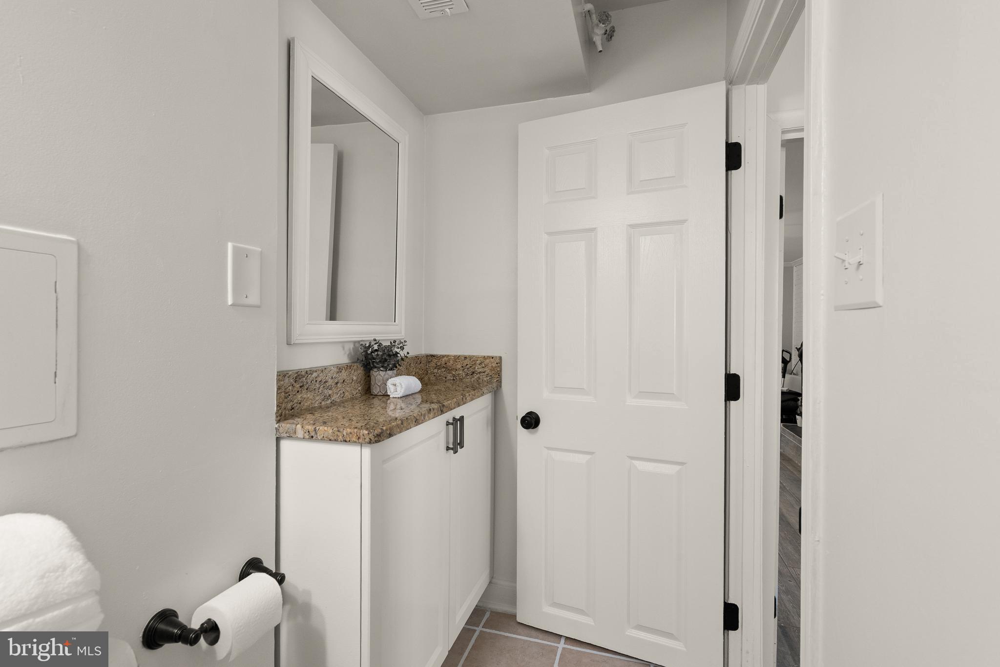 4006 Novar Drive Chantilly, VA 20151 - Photo 19 of 49 a bathroom with a sink and vanity