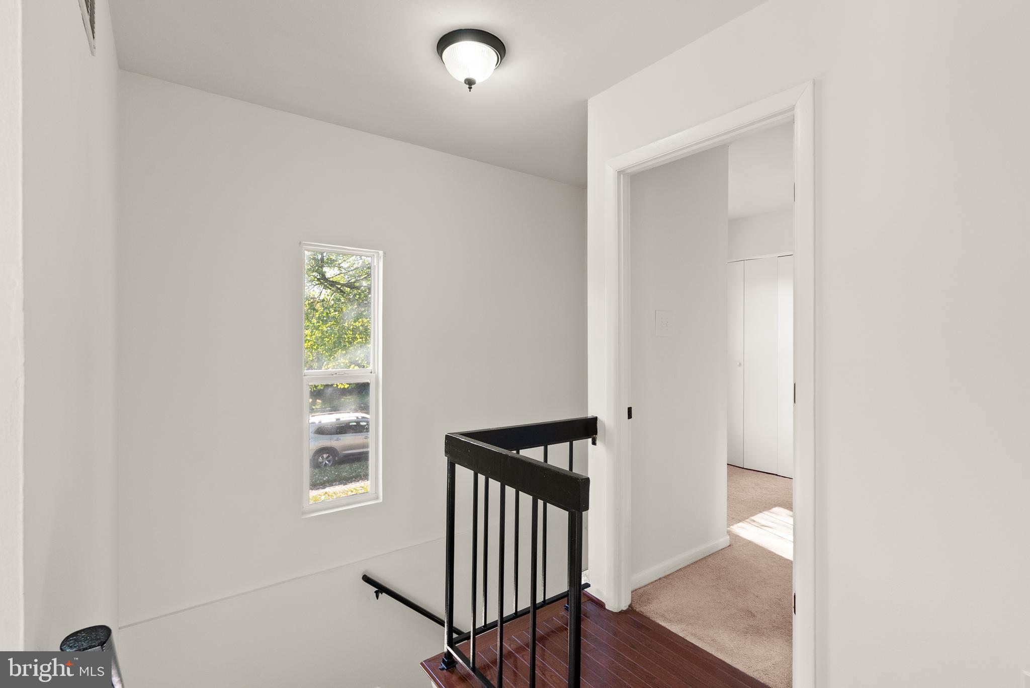 4006 Novar Drive Chantilly, VA 20151 - Photo 20 of 49 a view of a hallway with windows and stairs