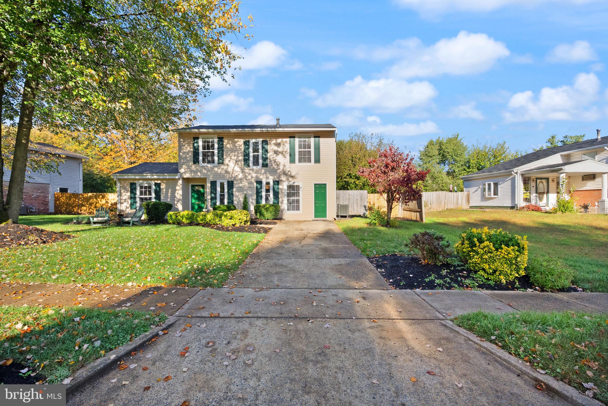 4006 Novar Drive Chantilly, VA 20151 - Photo 2 of 49 a front view of a residential houses with yard and green space
