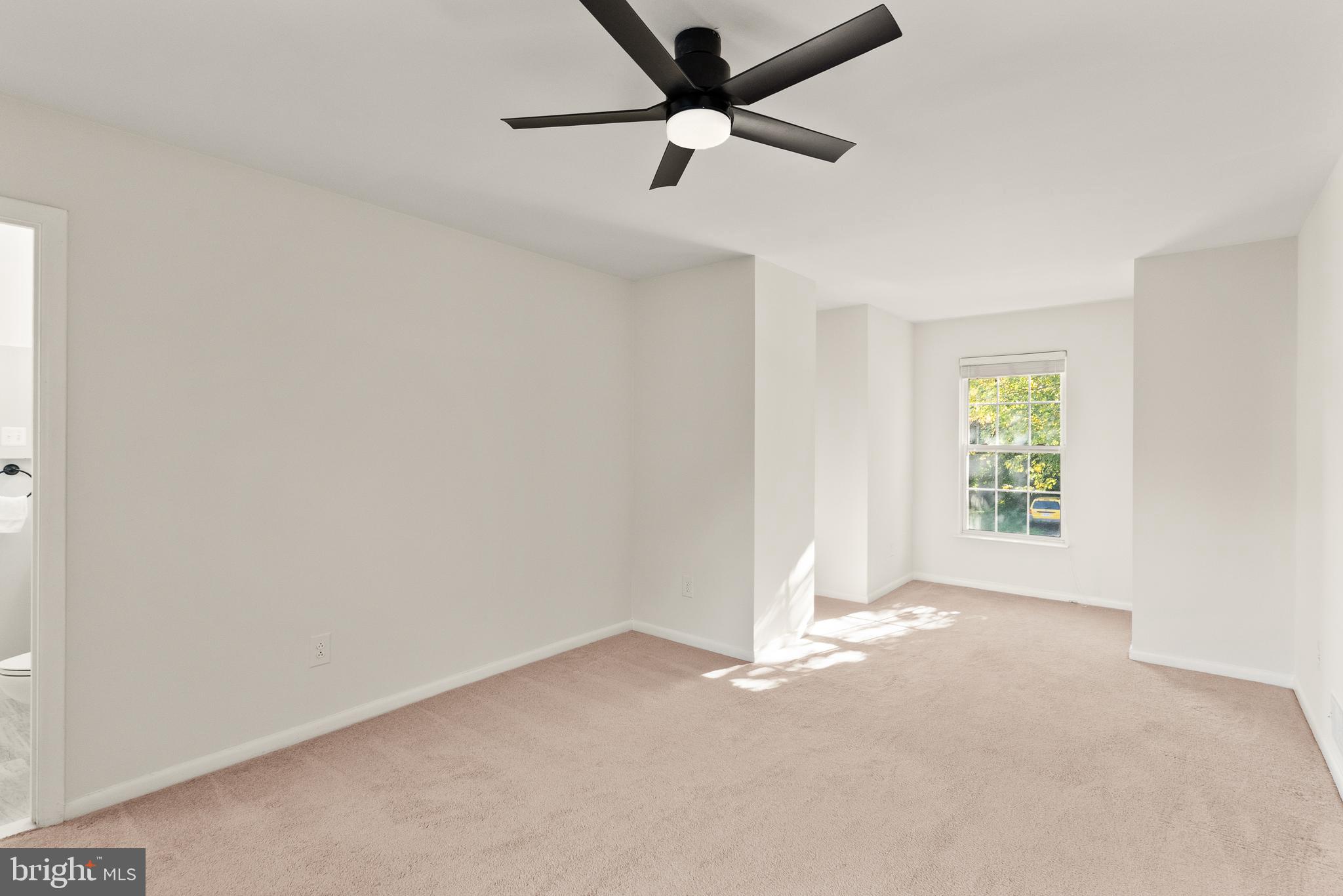 4006 Novar Drive Chantilly, VA 20151 - Photo 22 of 49 an empty room with a window and a fan