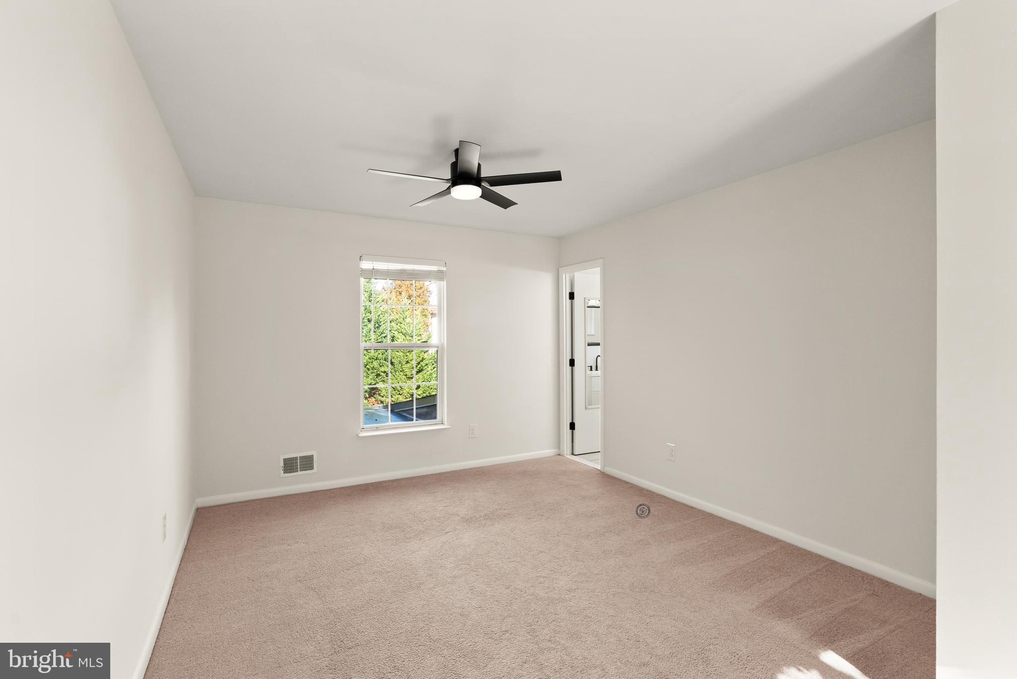 4006 Novar Drive Chantilly, VA 20151 - Photo 23 of 49 an empty room with windows and ceiling fan