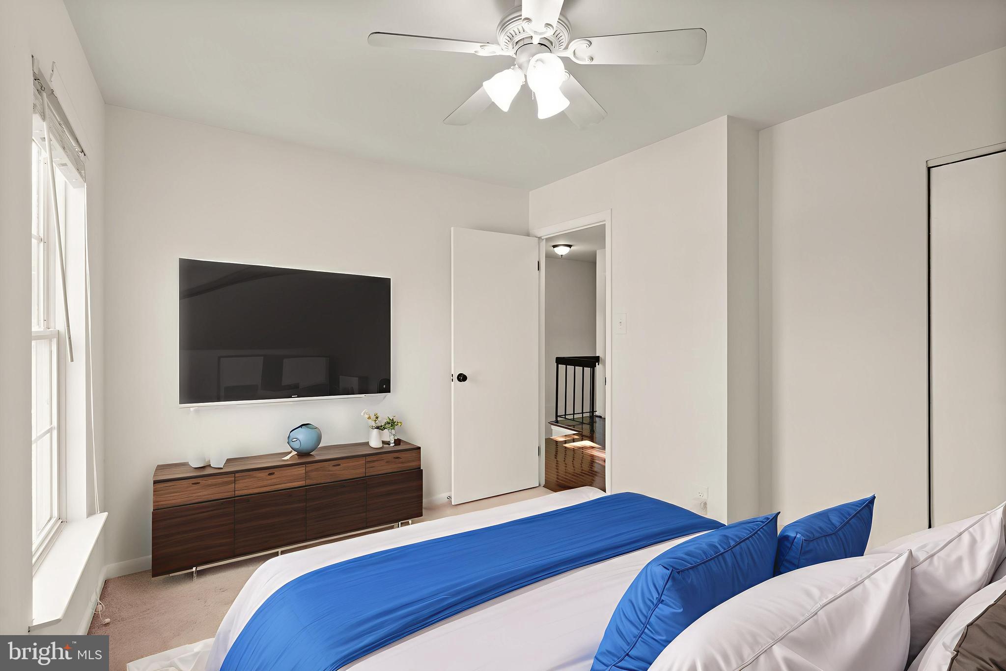 4006 Novar Drive Chantilly, VA 20151 - Photo 28 of 49 a bedroom with a bed and a flat screen tv