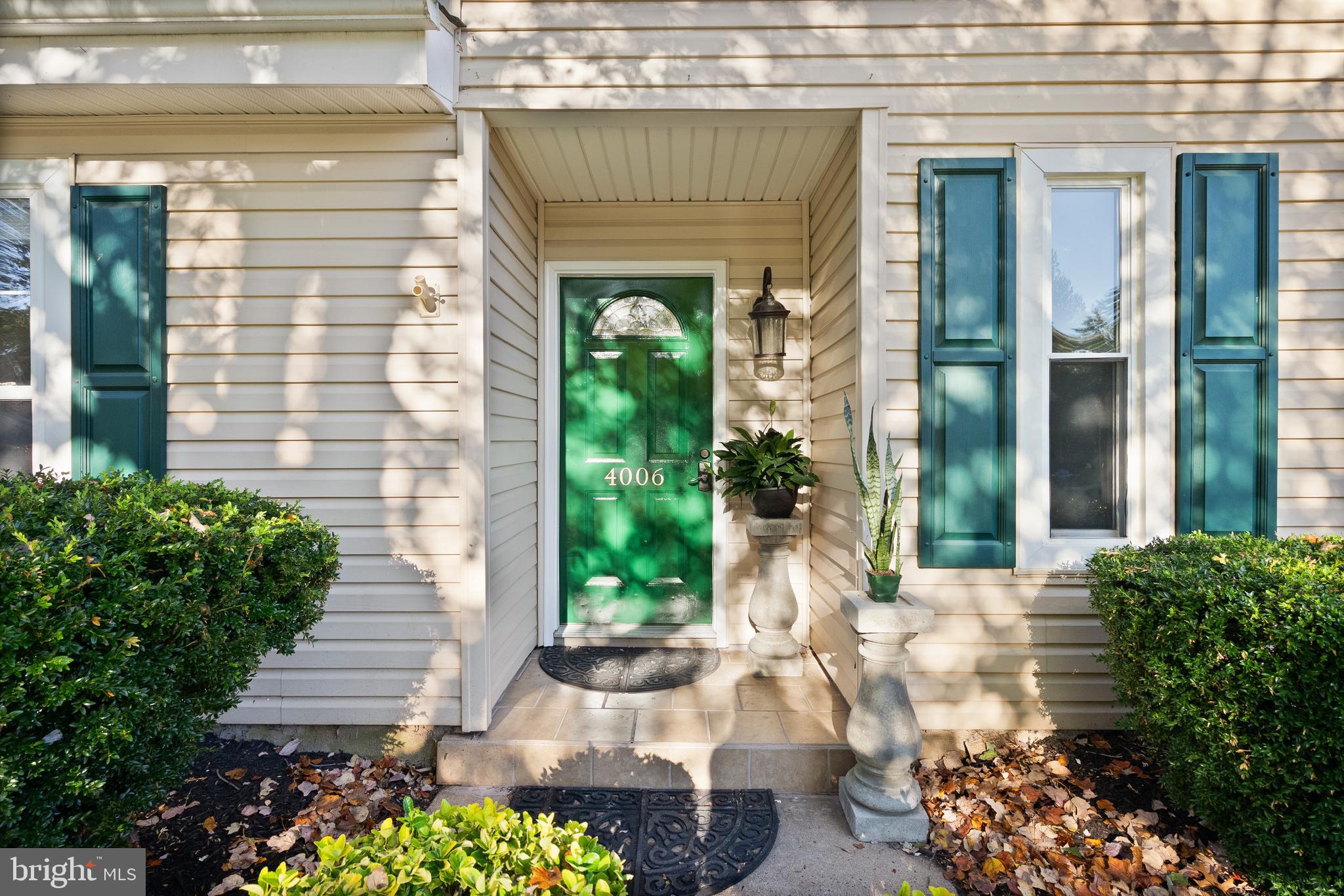 4006 Novar Drive Chantilly, VA 20151 - Photo 4 of 49 a front view of a house with a yard