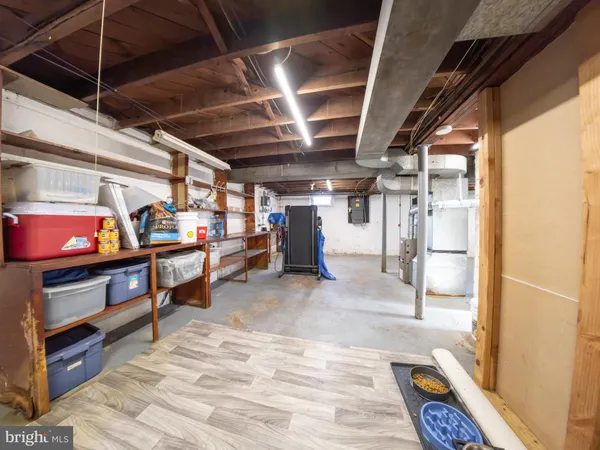 a view of an empty room with storage