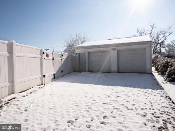 a view of a backyard of the house