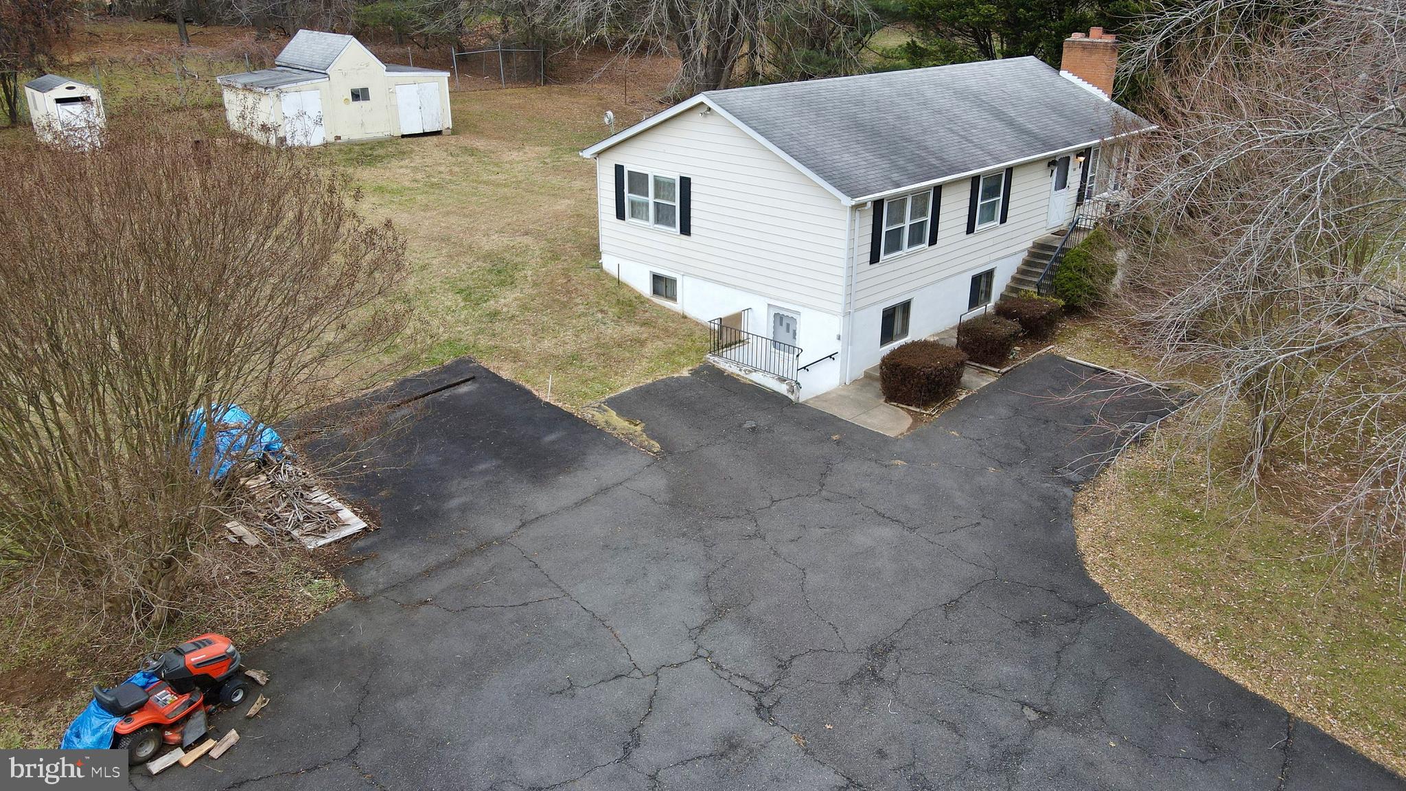 816 Utterback Store Road Great Falls, VA 22066 - Photo 21 of 28 a view of a house with a yard