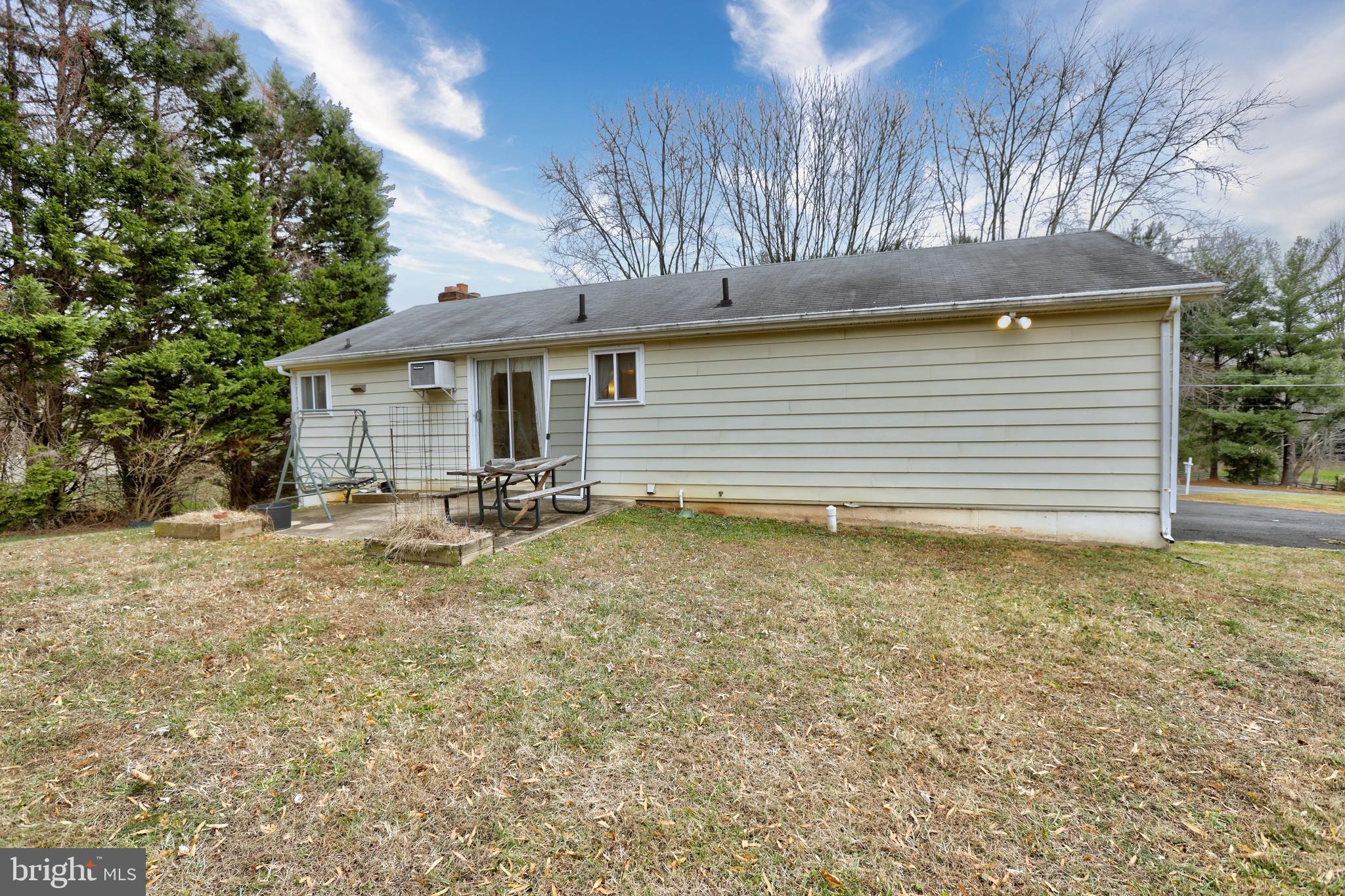 816 Utterback Store Road Great Falls, VA 22066 - Photo 24 of 28 a view of a house with a yard