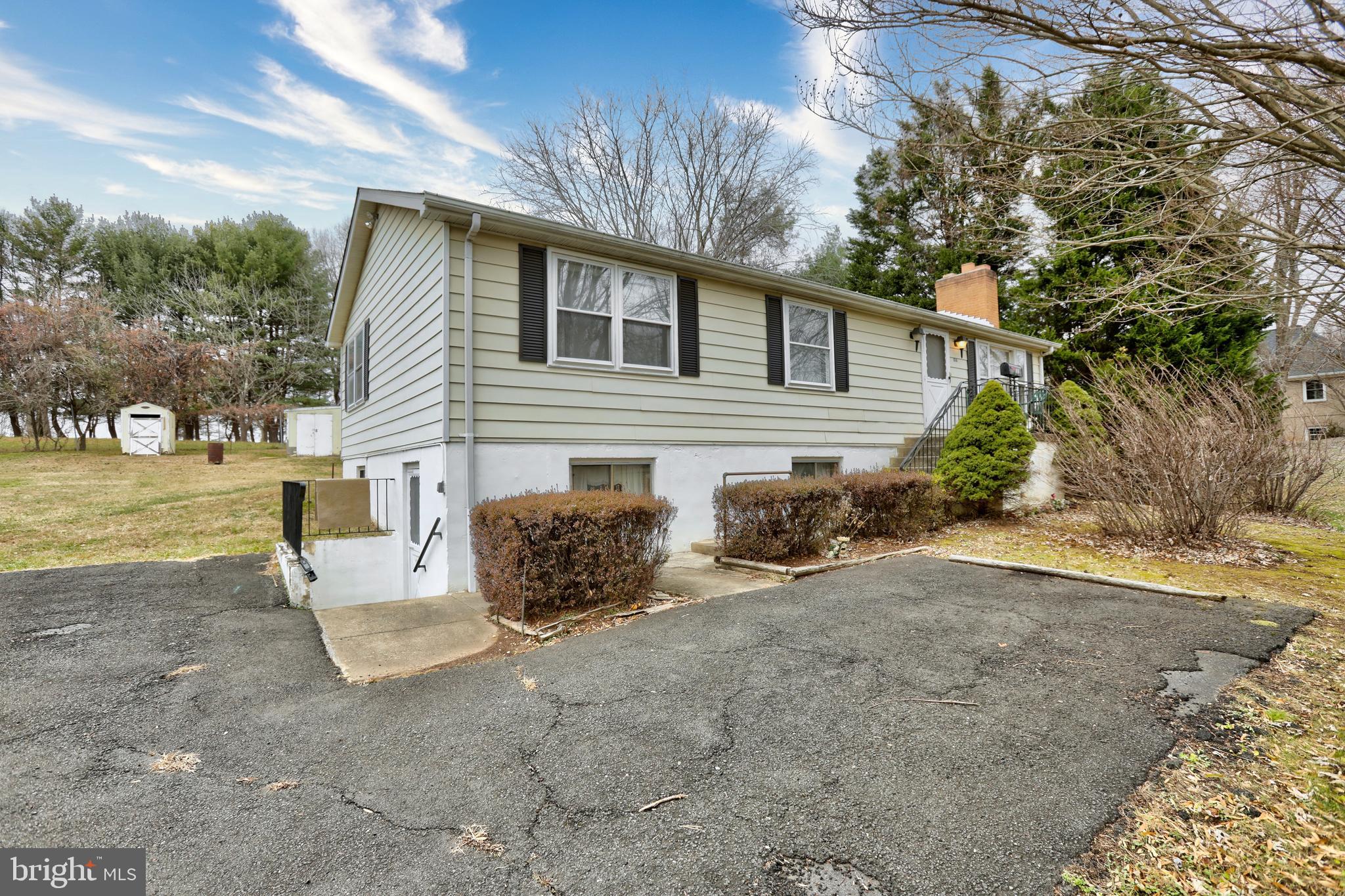 816 Utterback Store Road Great Falls, VA 22066 - Photo 25 of 28 a view of a house with backyard and sitting area