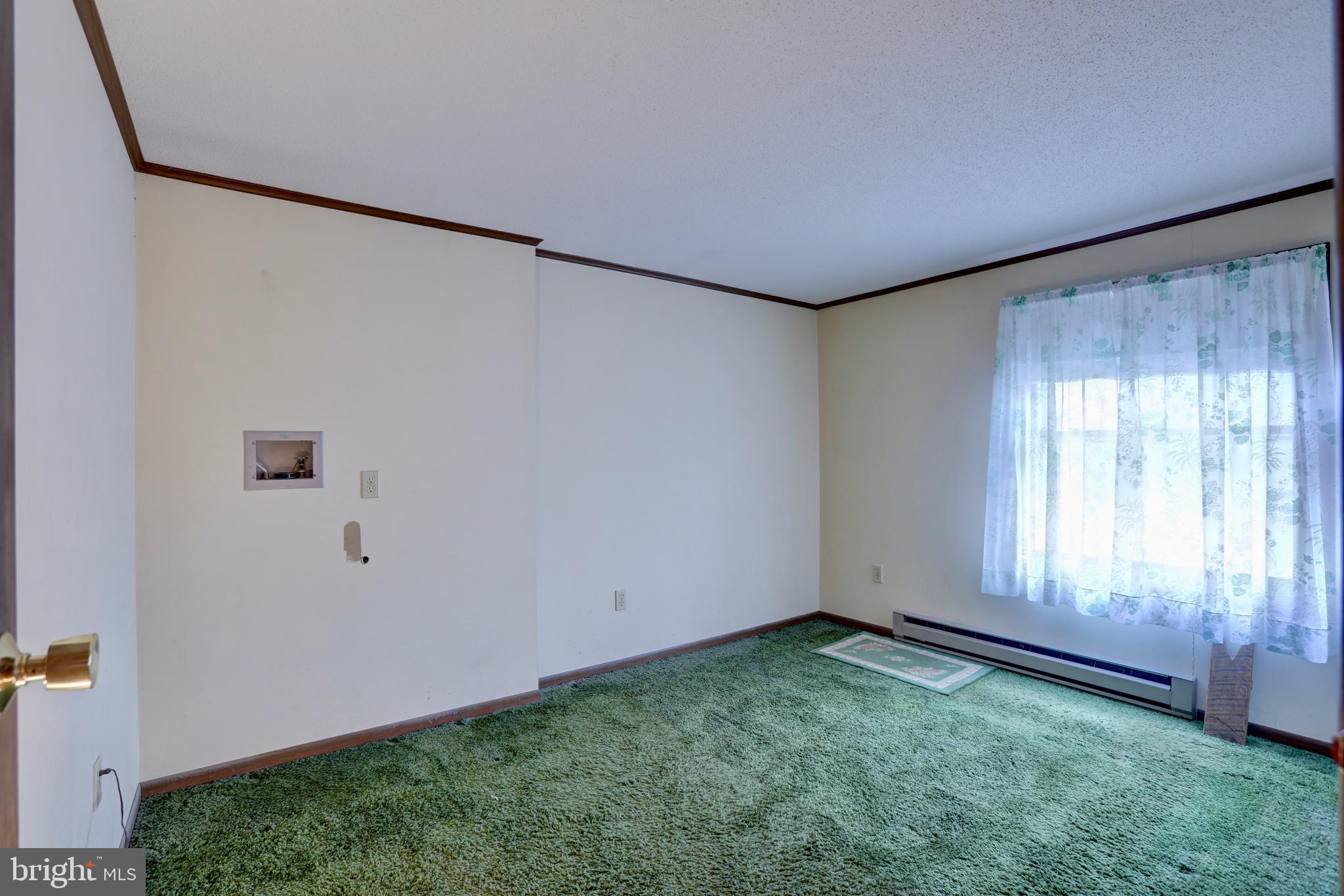 816 Utterback Store Road Great Falls, VA 22066 - Photo 9 of 28 an empty room with windows