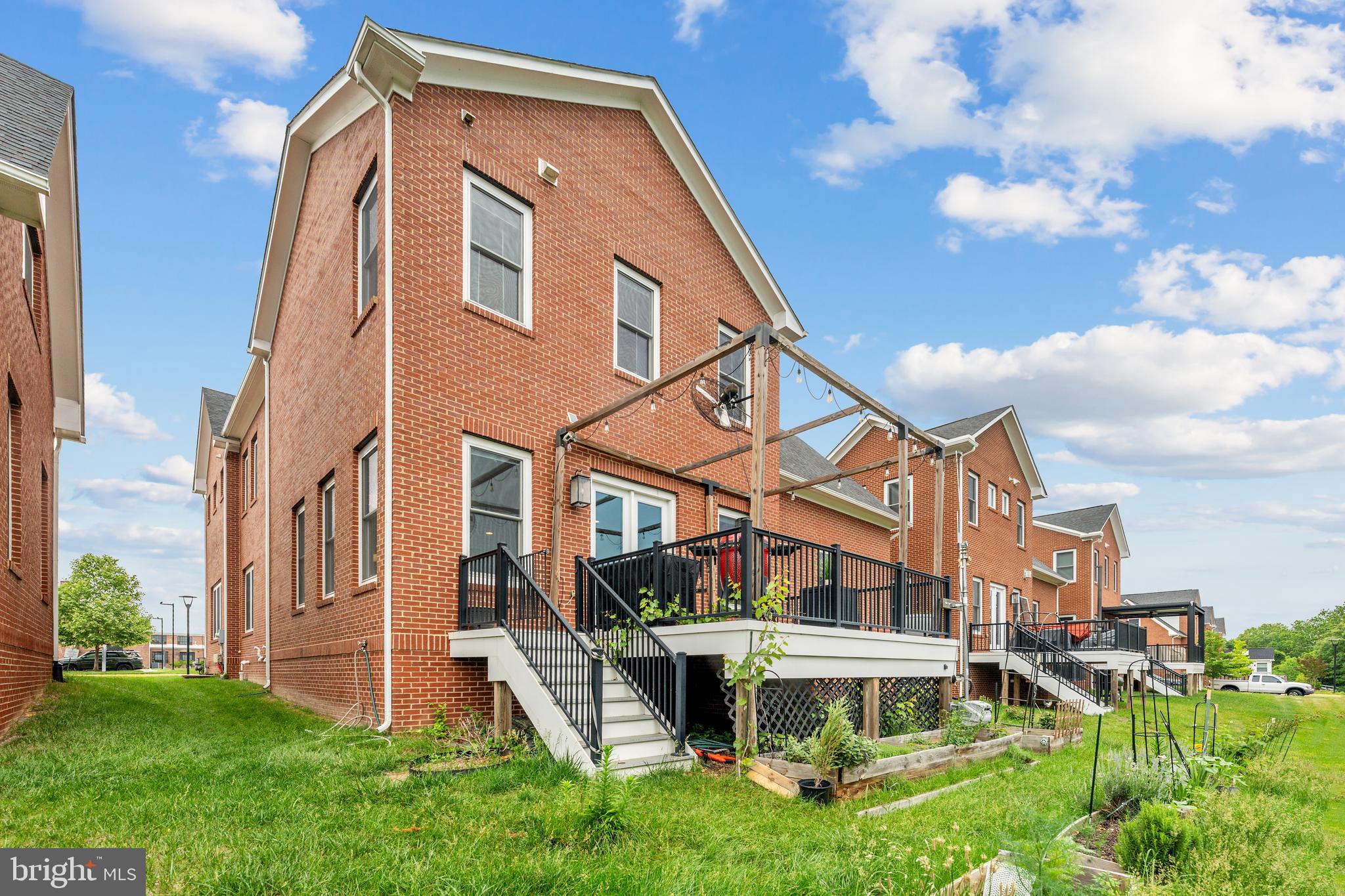 8459 Reformatory Way Lorton, VA 22079 - Photo 55 of 78 a view of a front of house with a yard