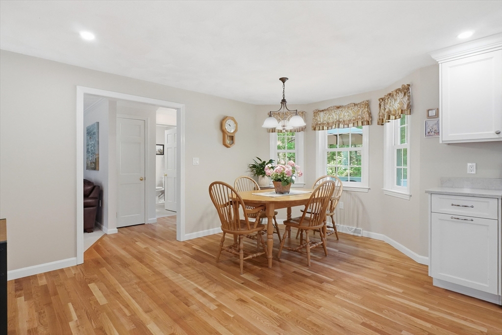 9 Fazio Farm Road Georgetown, MA 01833 - Photo 12 of 42 a view of a dining room with furniture window and wooden floor