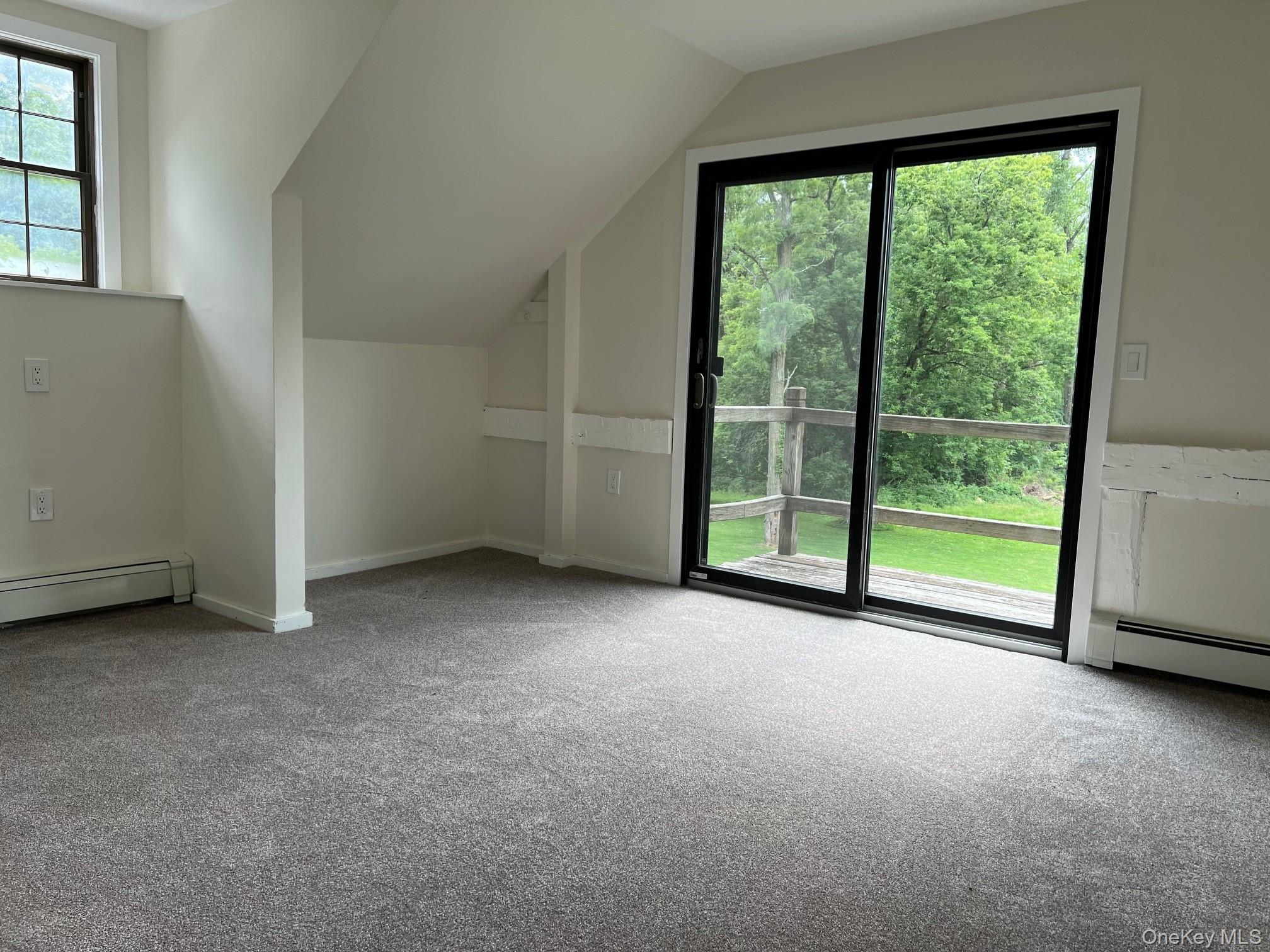 121 East Hook Cross Road Hopewell Junction, NY 12533 - Photo 5 of 16 Additional living space featuring carpet and lofted ceiling