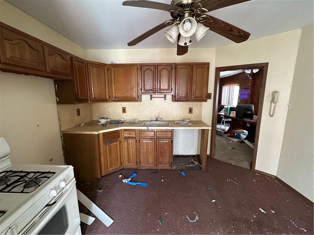 7 Canda Avenue Brooklyn, NY 11235 - Photo 11 of 18 a kitchen with a sink cabinets and window