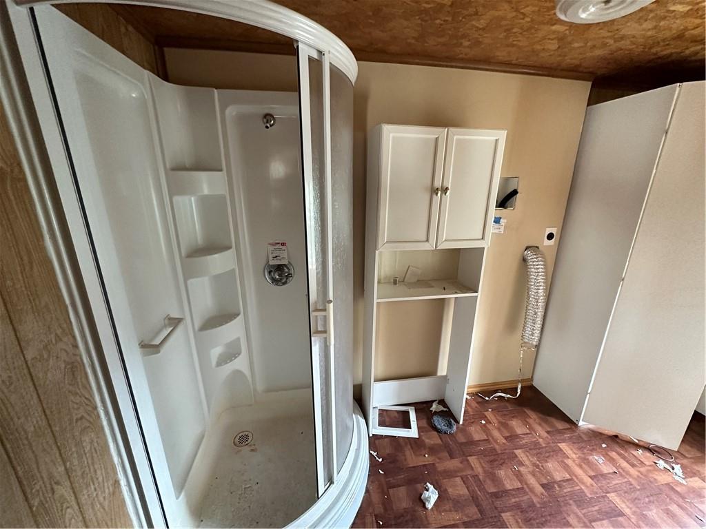 7 Canda Avenue Brooklyn, NY 11235 - Photo 13 of 18 a bathroom with a glass door shower and sink