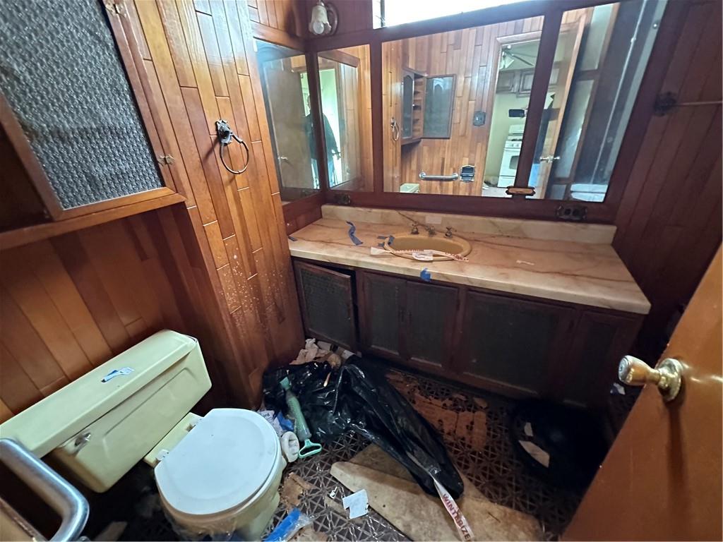 7 Canda Avenue Brooklyn, NY 11235 - Photo 16 of 18 a bathroom with a toilet a sink and a mirror