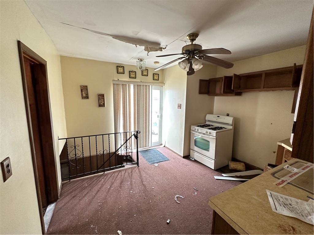 7 Canda Avenue Brooklyn, NY 11235 - Photo 9 of 18 a view of a livingroom with a furniture and a ceiling fan