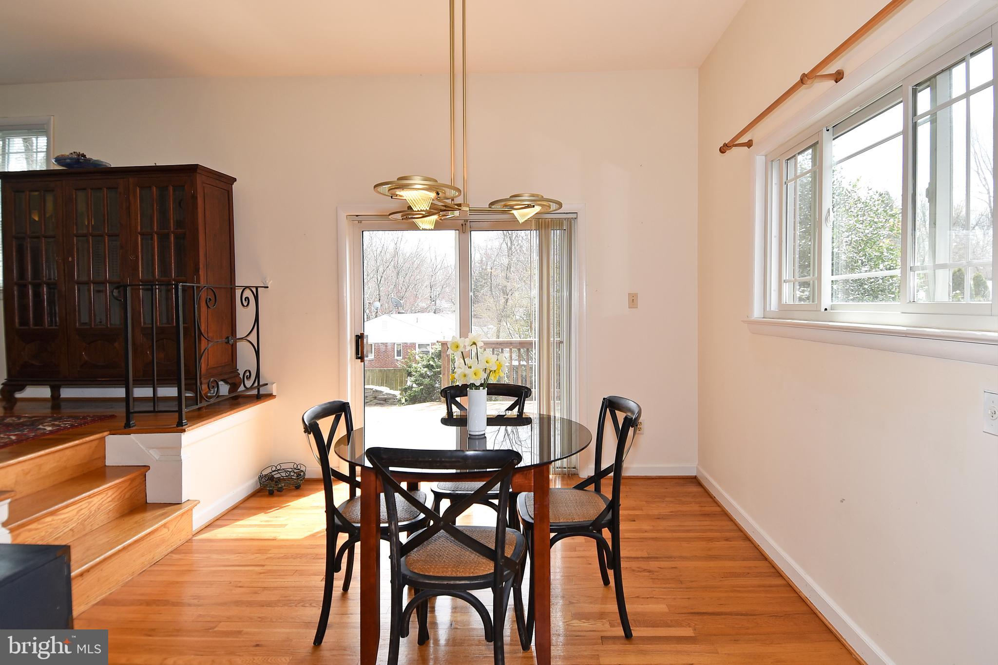 1606 Belvedere Boulevard Silver Spring, MD 20902 - Photo 11 of 30 Dining room leading to deck