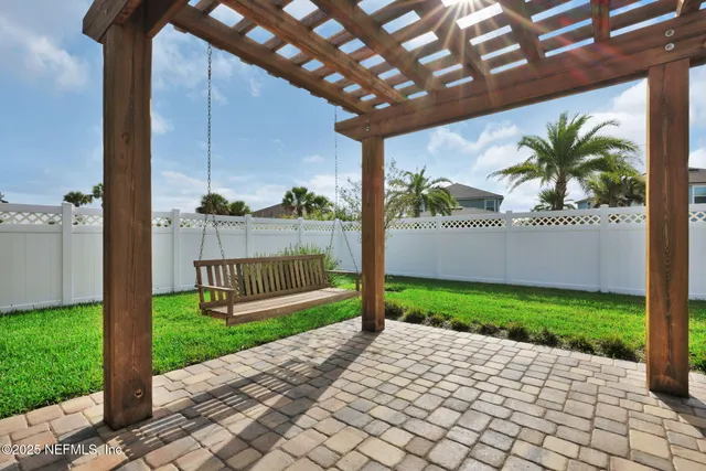 a view of a backyard with plants