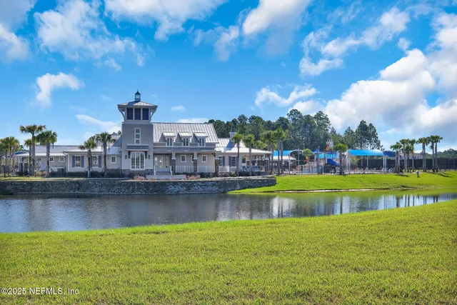 a view of a park with swings and slides