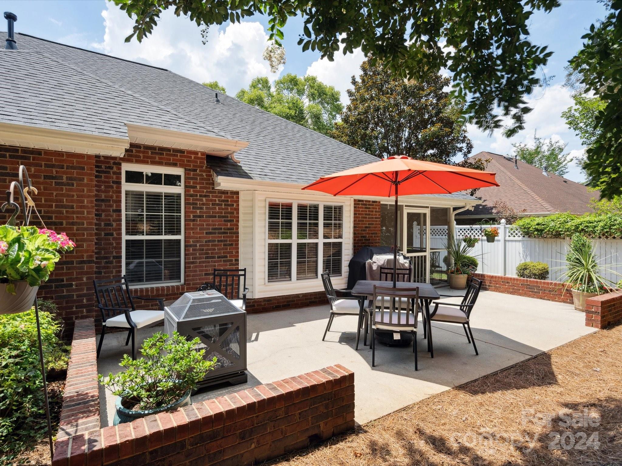 166 Zimmerman Drive Fort Mill, SC 29708 - Photo 27 of 30 a swimming pool with outdoor seating and yard