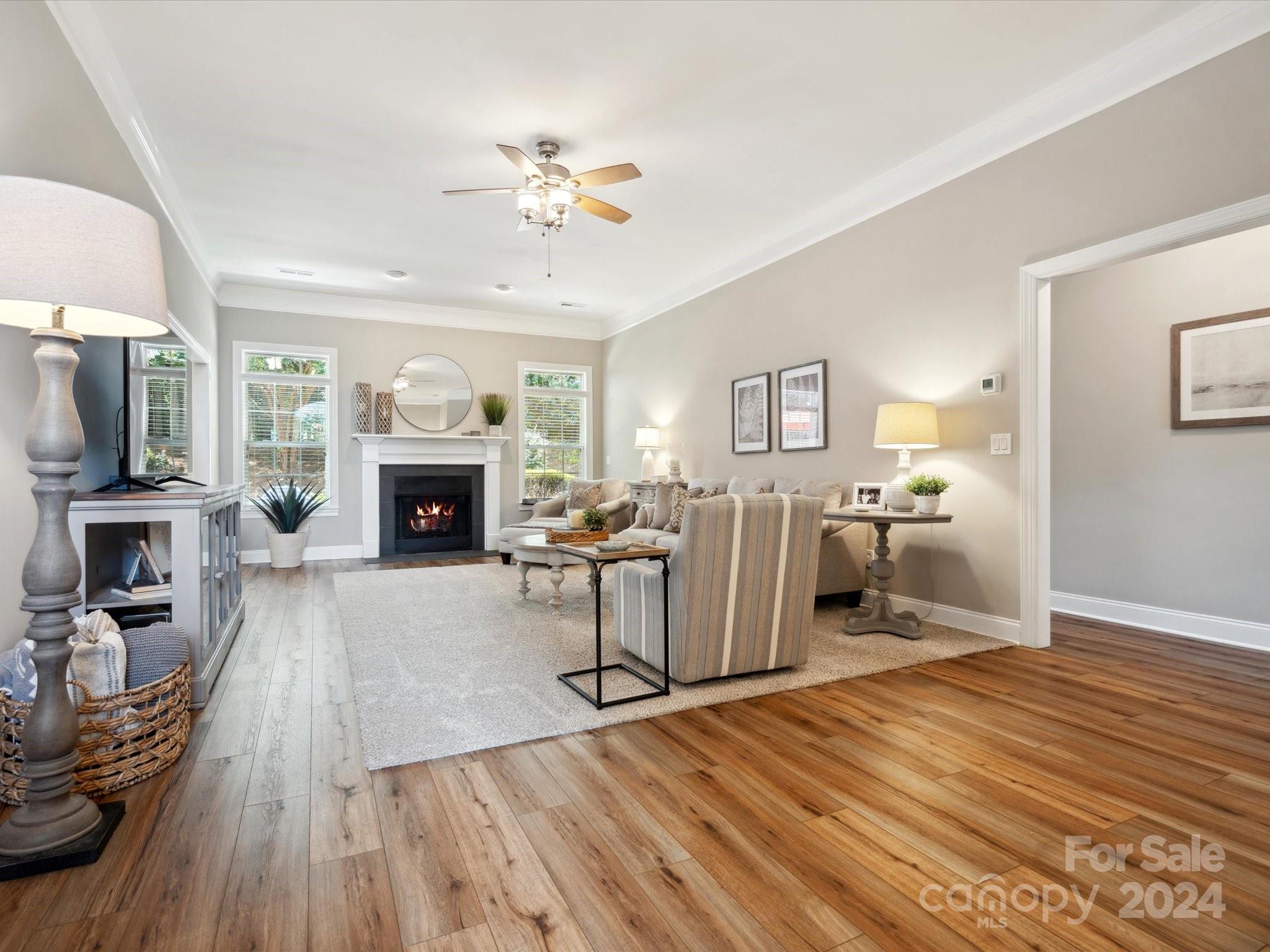 166 Zimmerman Drive Fort Mill, SC 29708 - Photo 5 of 30 a living room with furniture and a fireplace