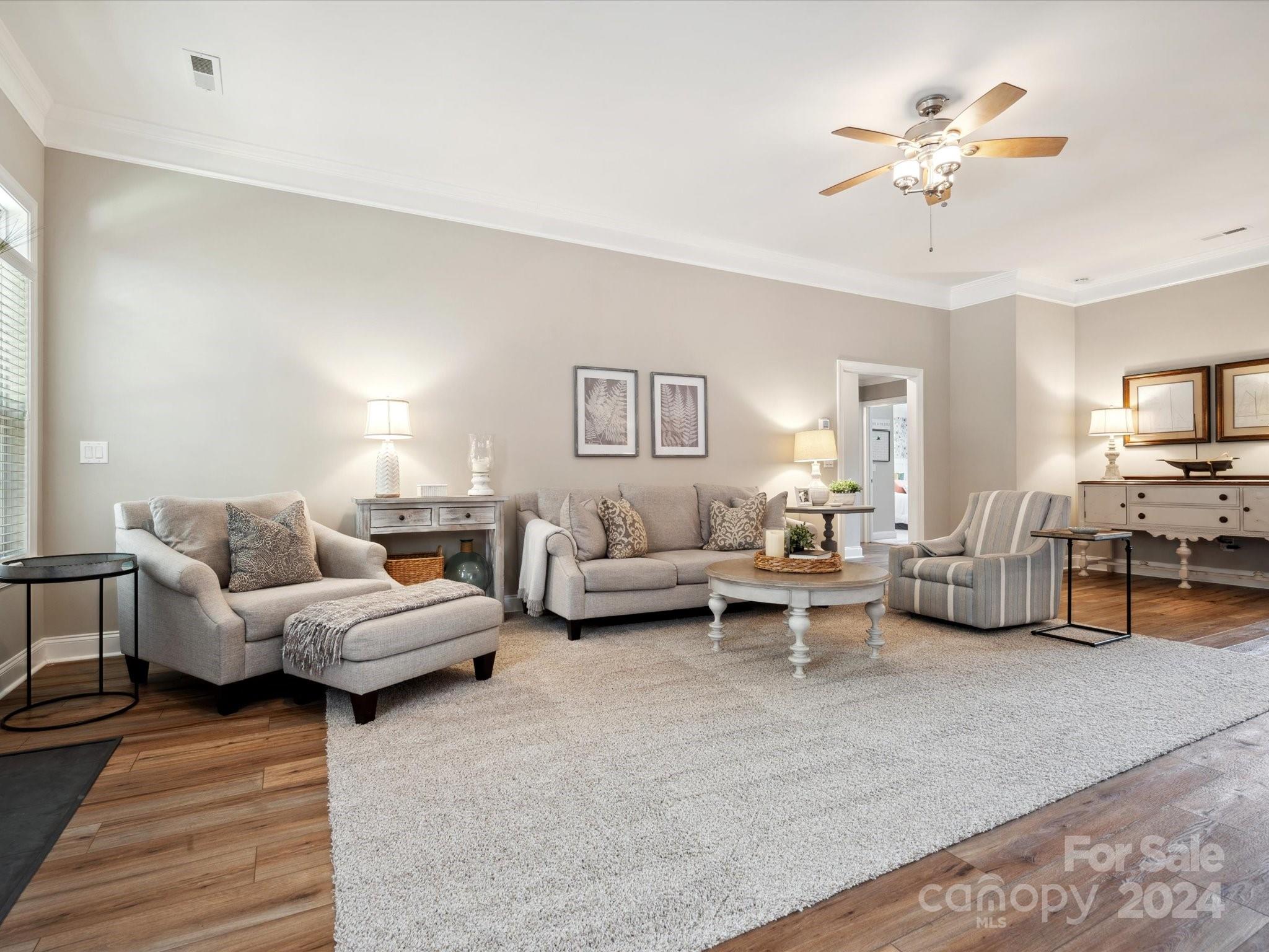 166 Zimmerman Drive Fort Mill, SC 29708 - Photo 6 of 30 a living room with furniture and white walls