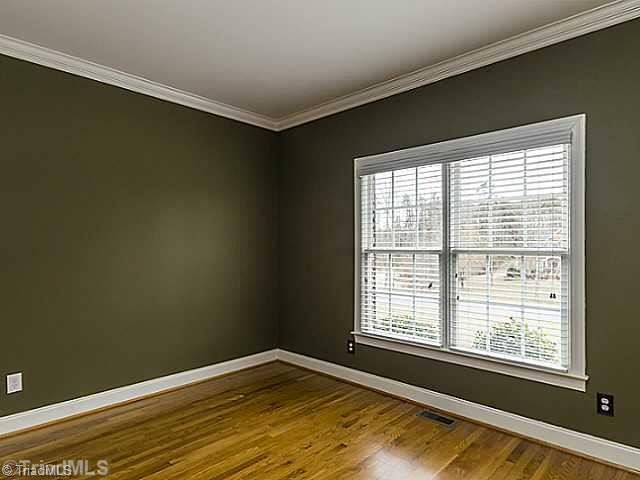 5403 Gray Leigh Drive Oak Ridge, NC 27310 - Photo 2 of 16 Executive Office/Suite. Main floor office 13 2" x 10 6" with beautiful hardwood floors and crown molding.