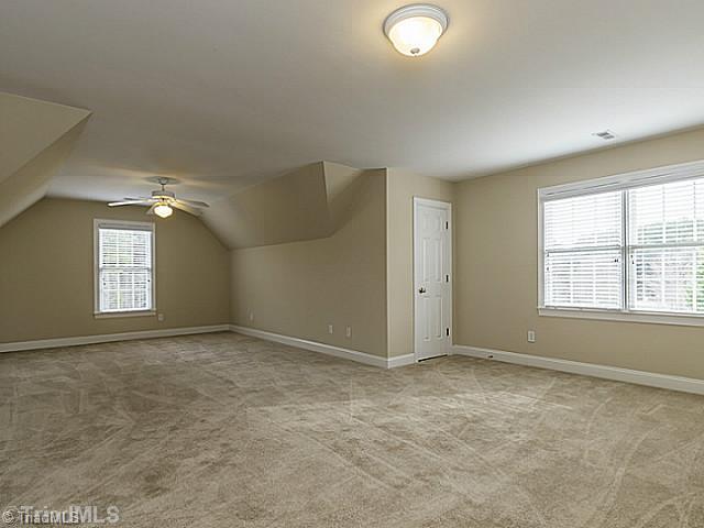 5403 Gray Leigh Drive Oak Ridge, NC 27310 - Photo 13 of 16 Bonus. This large bonus room (23 x 12 8") has many possibilities, you could easily finish of the 3 attic spaces for a closet and make this a 5th bedroom.