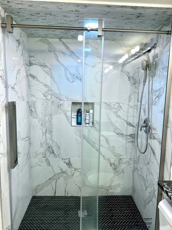 42 Evergreen Circle, Unit 42 Canton, MA 02021 - Photo 16 of 26 a bathroom with a shower