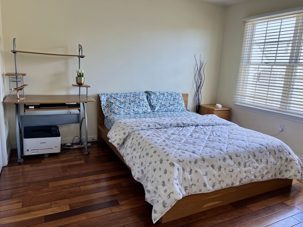 42 Evergreen Circle, Unit 42 Canton, MA 02021 - Photo 18 of 26 a bedroom with a bed and a tv