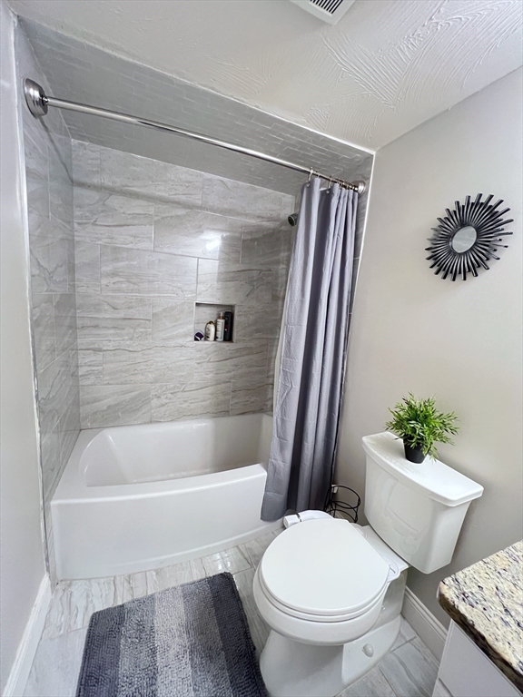 42 Evergreen Circle, Unit 42 Canton, MA 02021 - Photo 20 of 26 a bathroom with a toilet and a shower