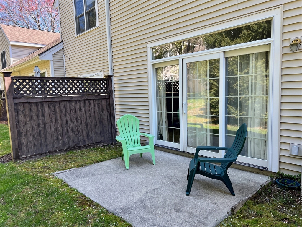 42 Evergreen Circle, Unit 42 Canton, MA 02021 - Photo 24 of 26 a view of a house with backyard and sitting area