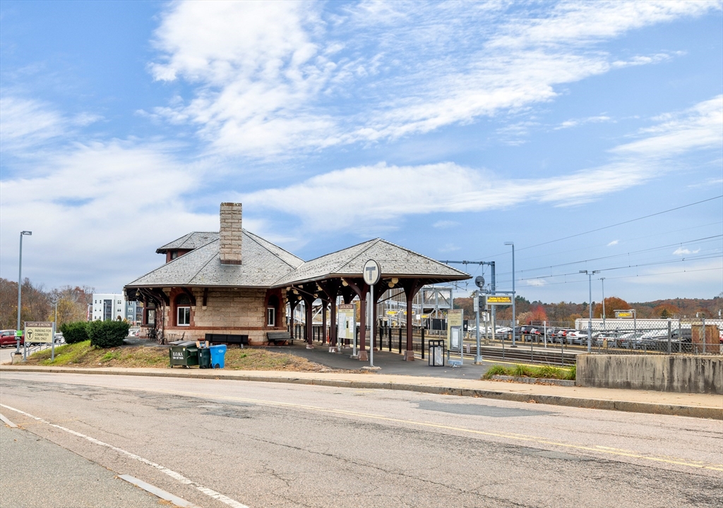42 Evergreen Circle, Unit 42 Canton, MA 02021 - Photo 25 of 26 a view of a big house with a big yard and large trees