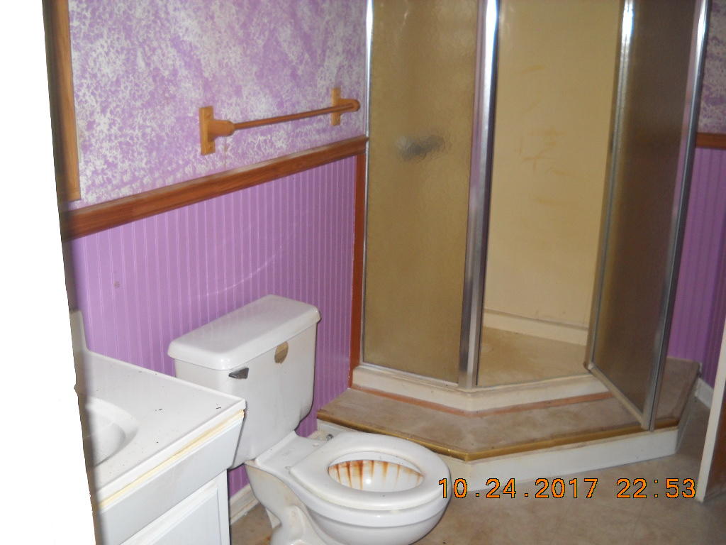 1590 Cox Store Road Southwest Floyd, VA 24091 - Photo 14 of 25 a bathroom with a sink and a mirror