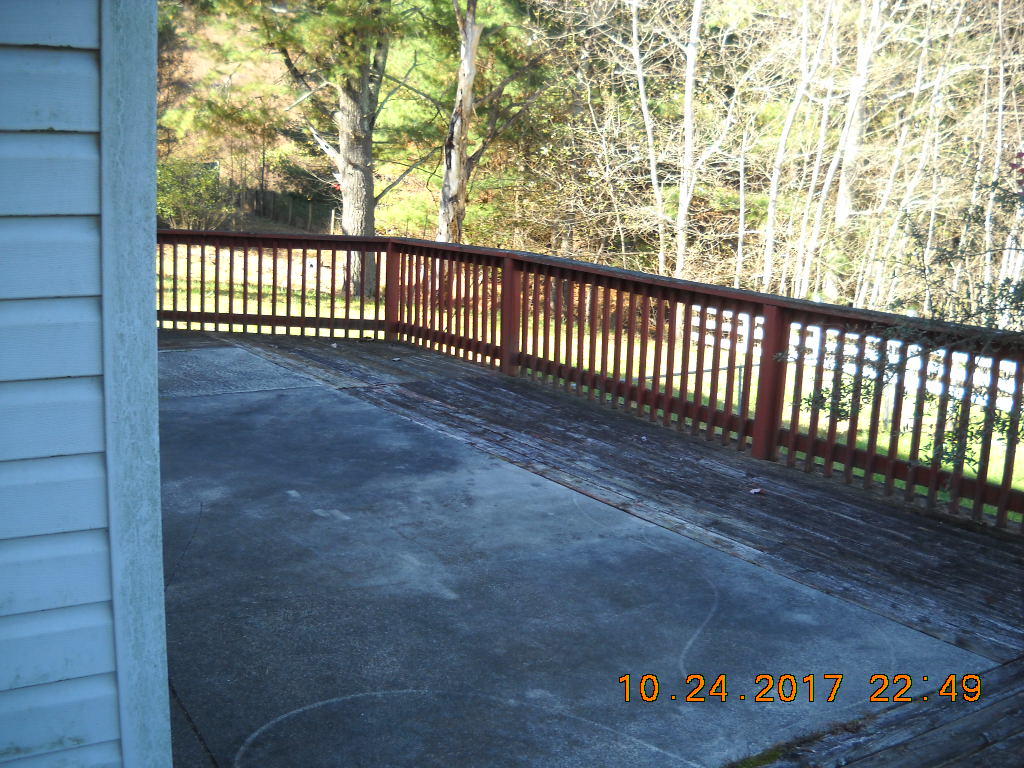 1590 Cox Store Road Southwest Floyd, VA 24091 - Photo 7 of 25 a view of a balcony with a pot