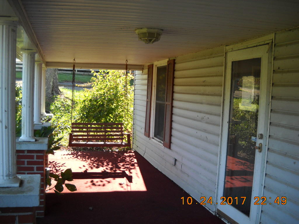 1590 Cox Store Road Southwest Floyd, VA 24091 - Photo 8 of 25 a view of a entryway door front of house