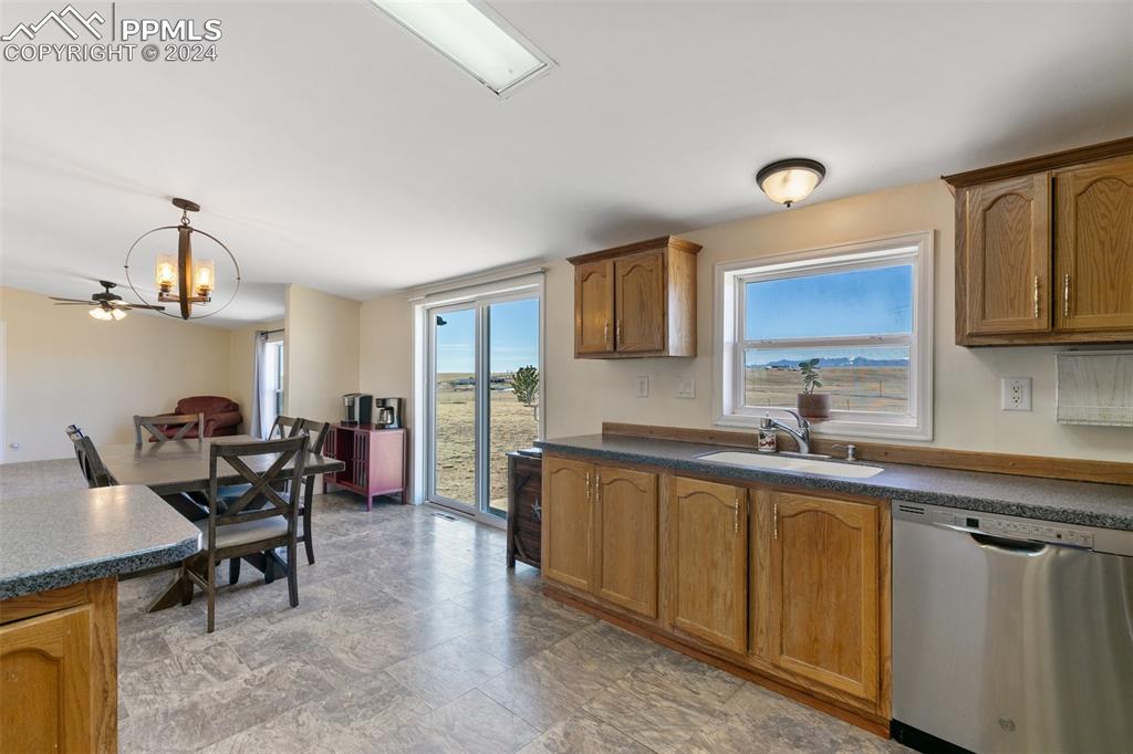18830 Kevin's View Peyton, CO 80831 - Photo 14 of 37 Spacious kitchen and dining area