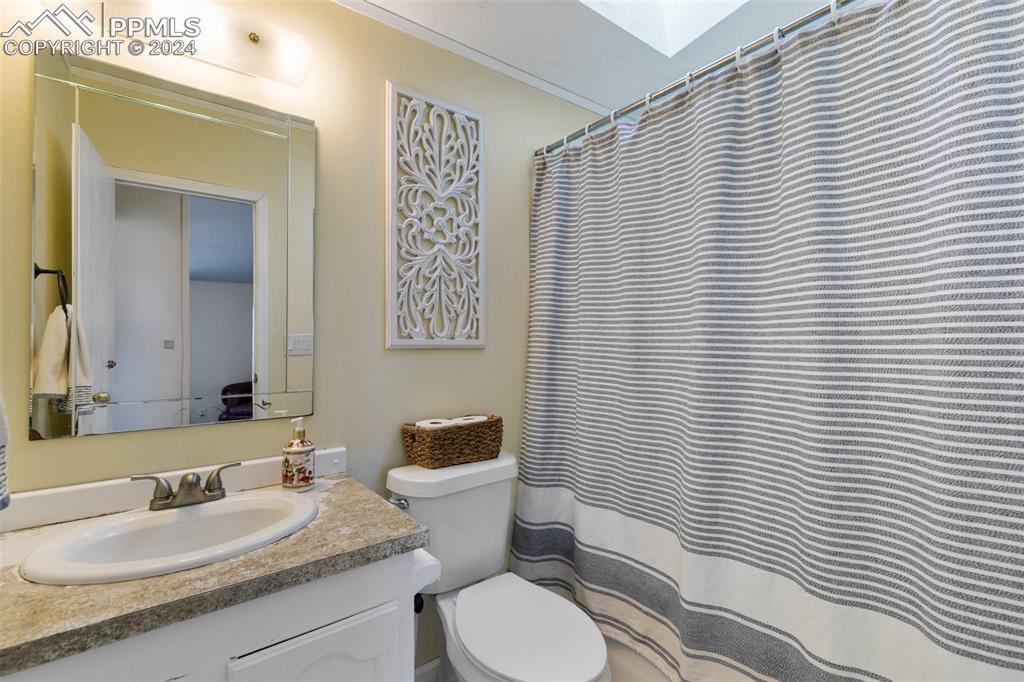 18830 Kevin's View Peyton, CO 80831 - Photo 30 of 37 Full bathroom with tub/shower near the 3 south end bedrooms