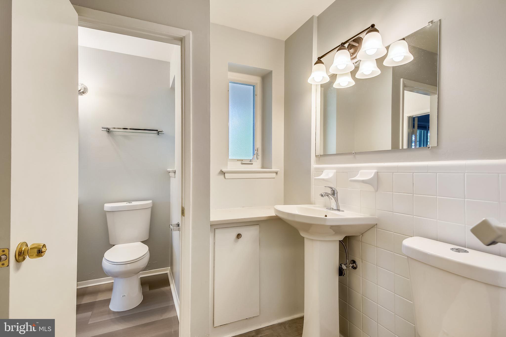 6729 Front Royal Road Springfield, VA 22151 - Photo 13 of 30 Master Bathroom/Hall Bathroom