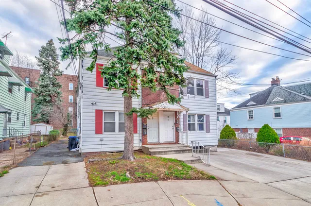 a front view of house with yard