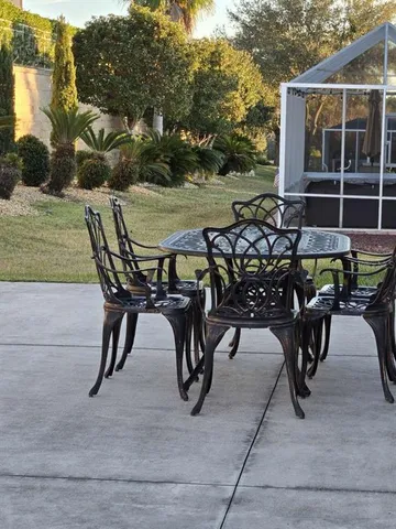 a view of a chairs and table on the terrace