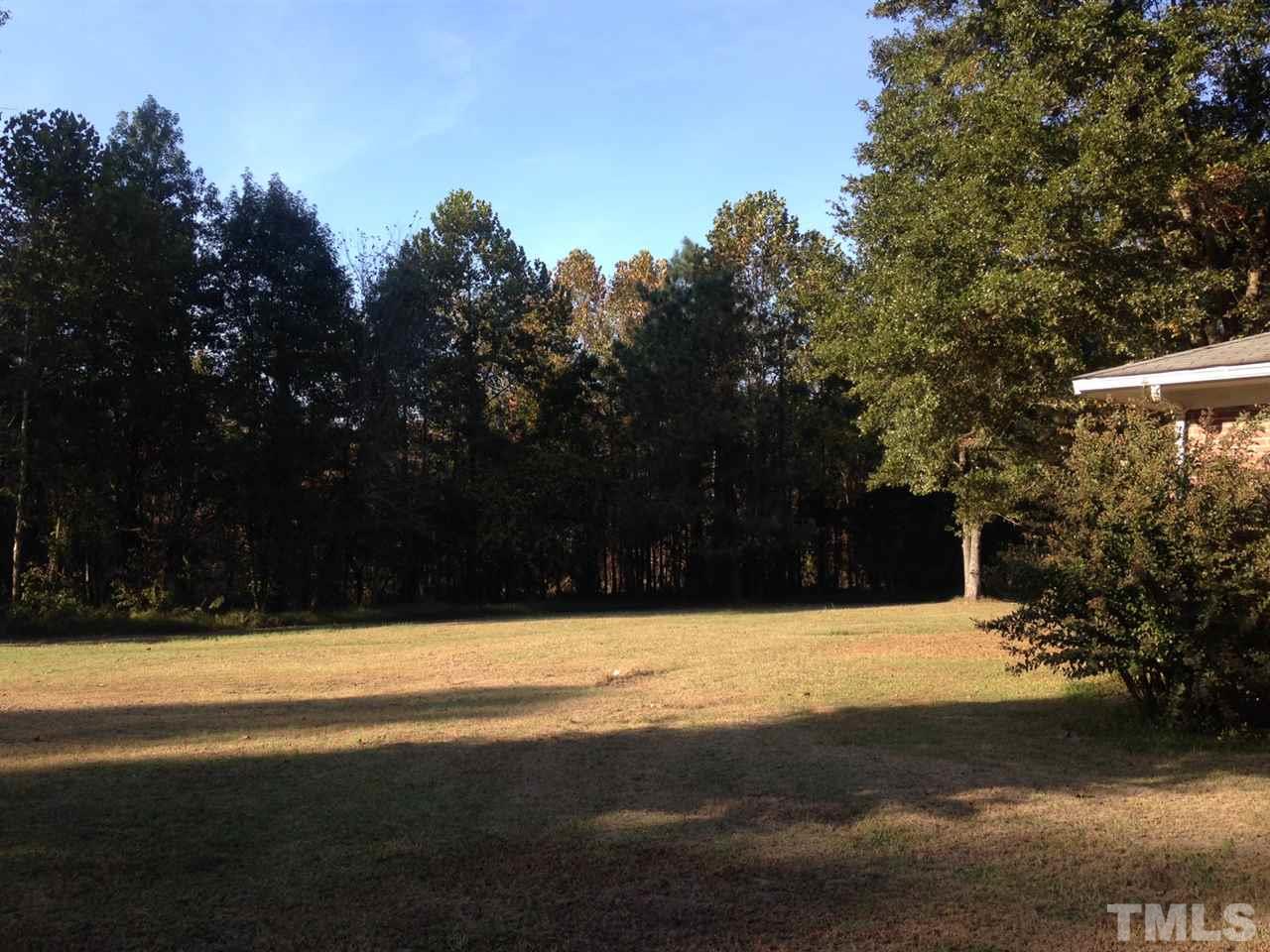 2124 Lizard Lick Road Zebulon, NC 27597 - Photo 8 of 9 a view of yard with trees