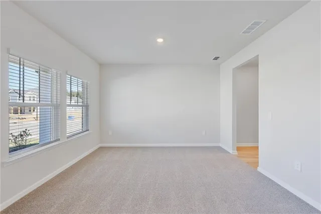 an empty room with windows