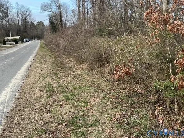 a view of a city street with a building