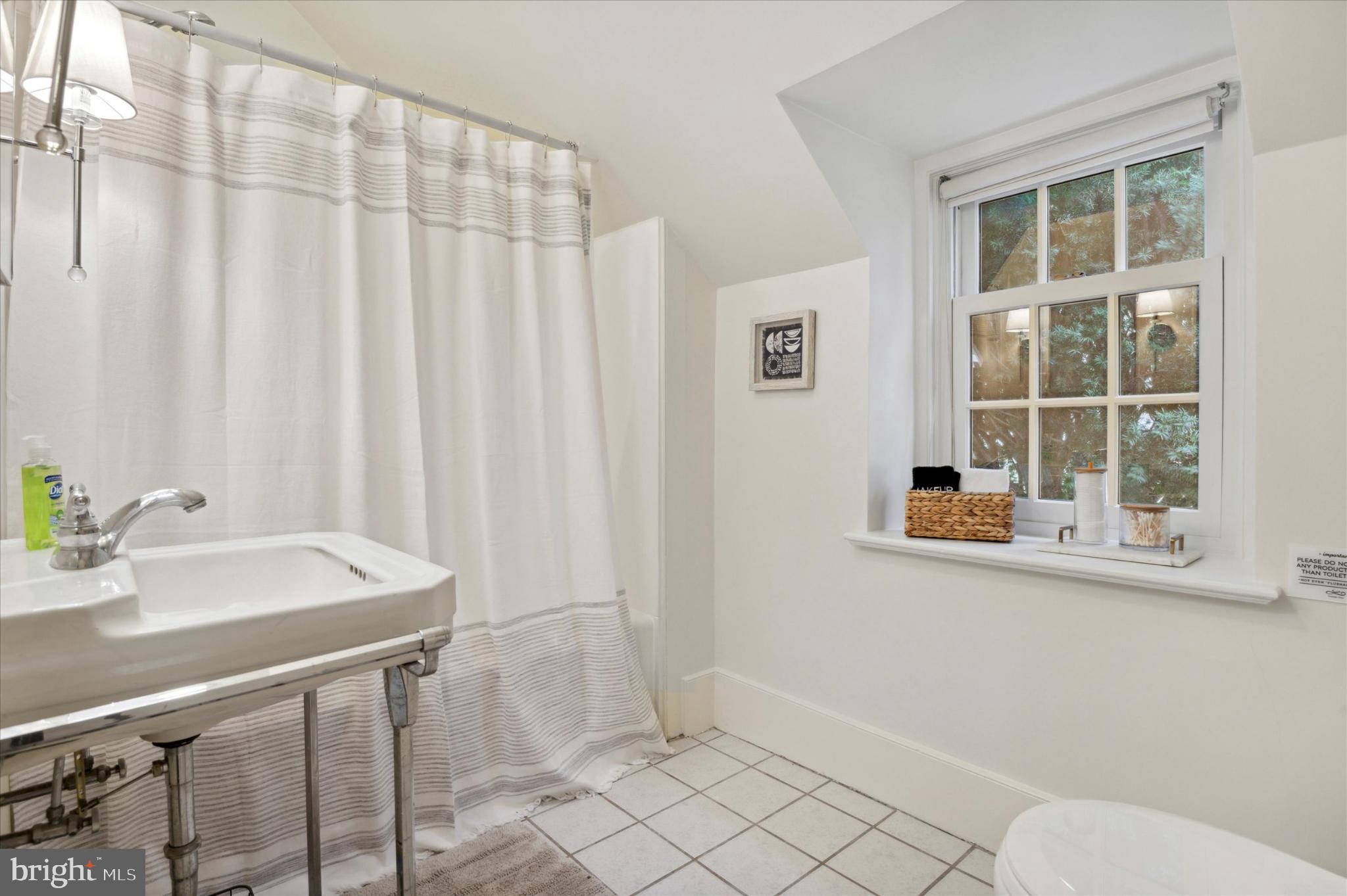 565 Upper Pike Creek Road Newark, DE 19711 - Photo 16 of 23 Bright and airy bathroom with natural light.