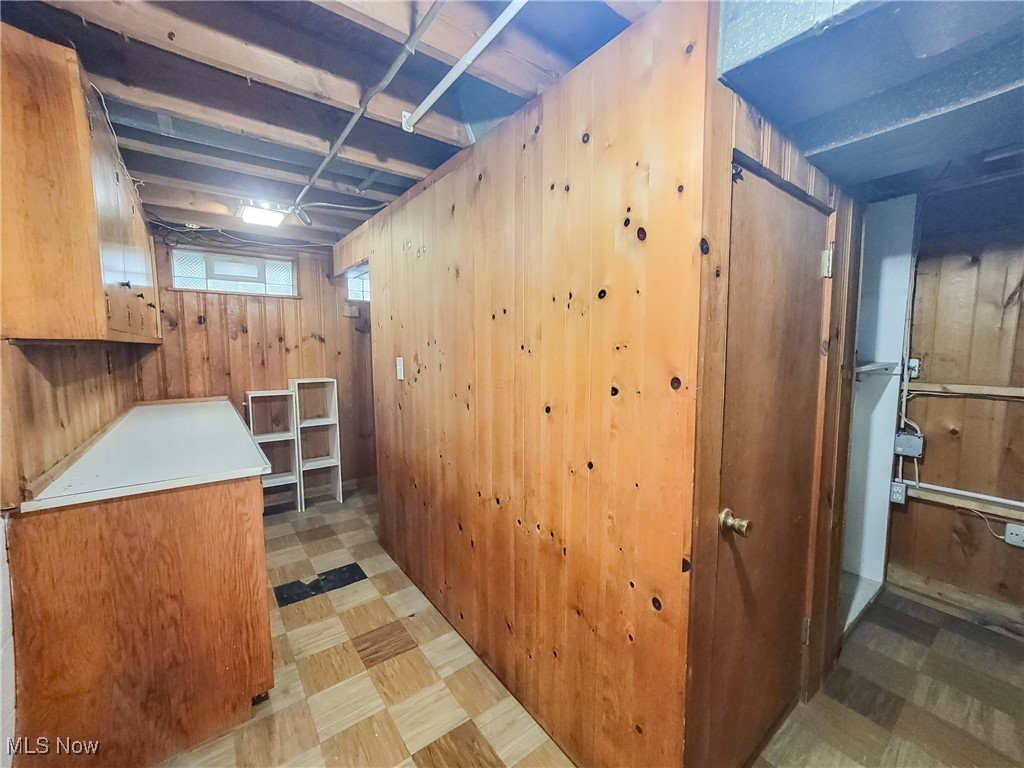 4160 Patton Road Cleveland, OH 44109 - Photo 18 of 20 Storage area or workshop area in the basement. The walk in closet is in this area. This area is next to the laundry room.
