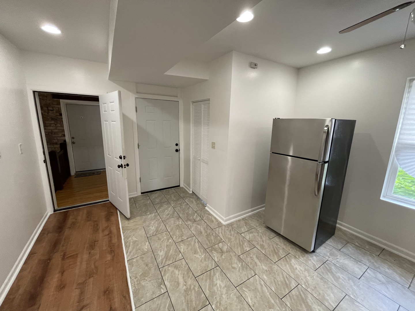 1320 West 57th Street, Unit 2 Chicago, IL 60636 - Photo 6 of 18 a view of entryway with wooden floor