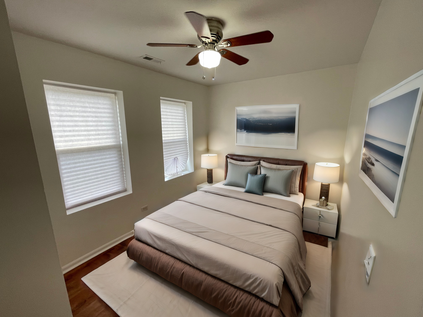 1320 West 57th Street, Unit 2 Chicago, IL 60636 - Photo 9 of 18 a bedroom with a bed and a ceiling fan