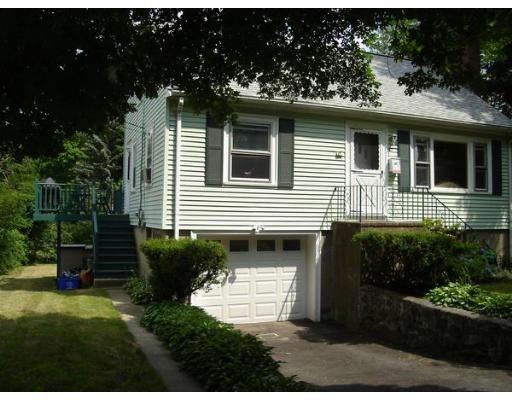 47 Stone Road Arlington, MA 02474 - Photo 6 of 10 a front view of a house with garden